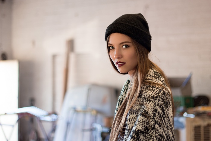 Savvy Taylor wearing a black beanie and patterned sweater