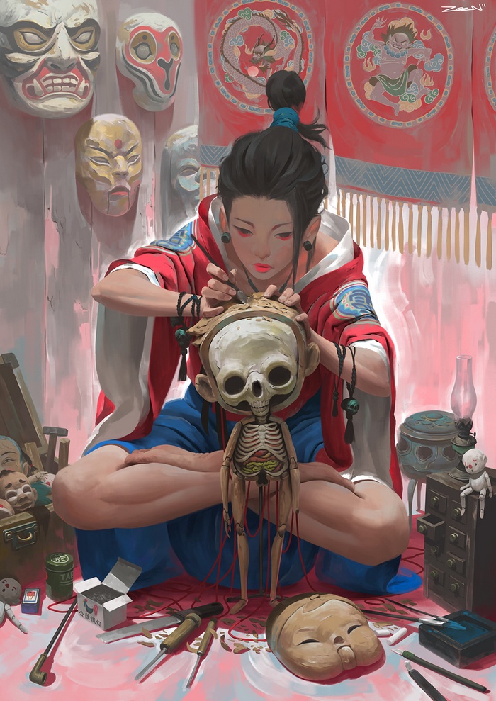 Woman working on a skeleton puppet with masks