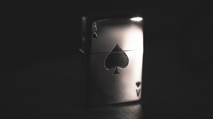 Silver Zippo lighter with Ace of Spades design