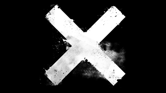 Grunge white cross on black background