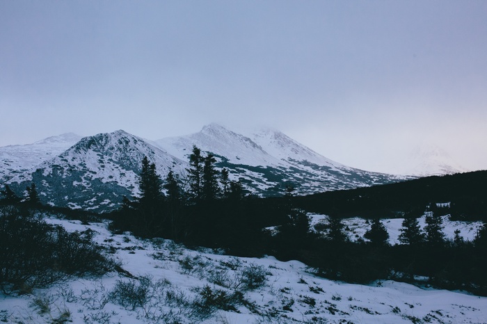 Snowy mountain peaks in a vast landscape