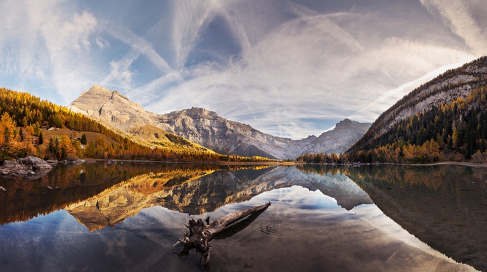 Autumn mountains reflected in a calm lake