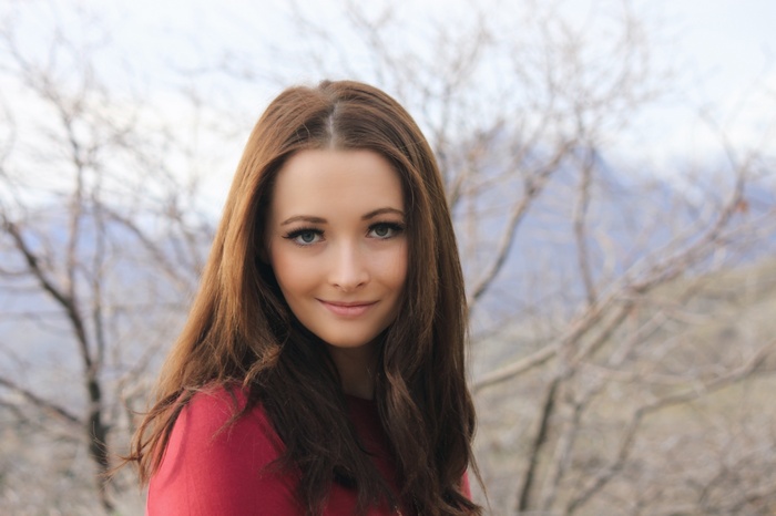 Alexis Crystal Jensen wearing red clothing
