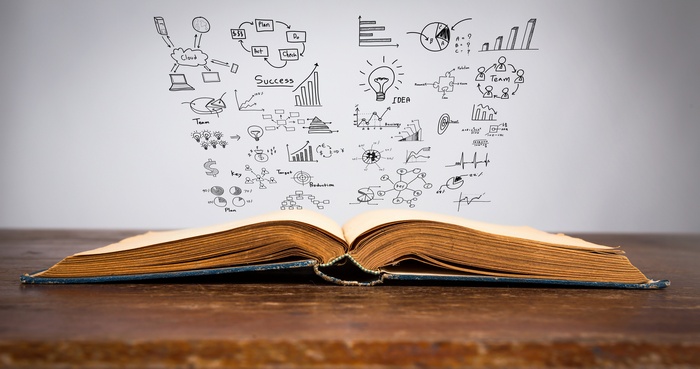 Open book with business charts and diagrams