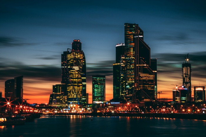 City skyline with skyscrapers at sunset