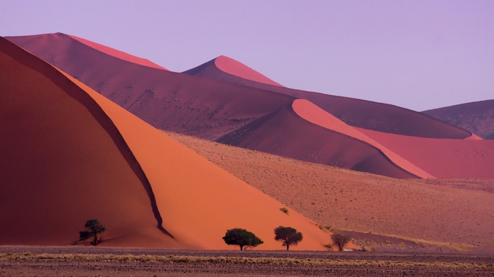 Desert dunes in Namibia at sunset