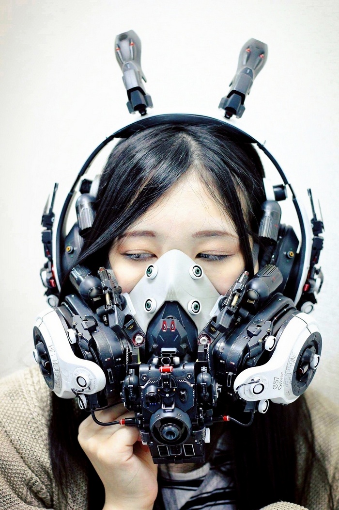 Cyberpunk girl wearing a futuristic mask and headphones