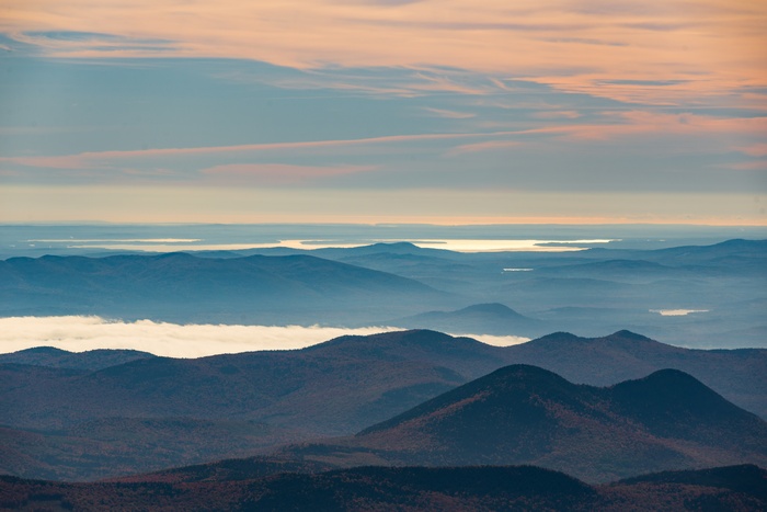 Mountain landscape with lakes and clouds at sunset