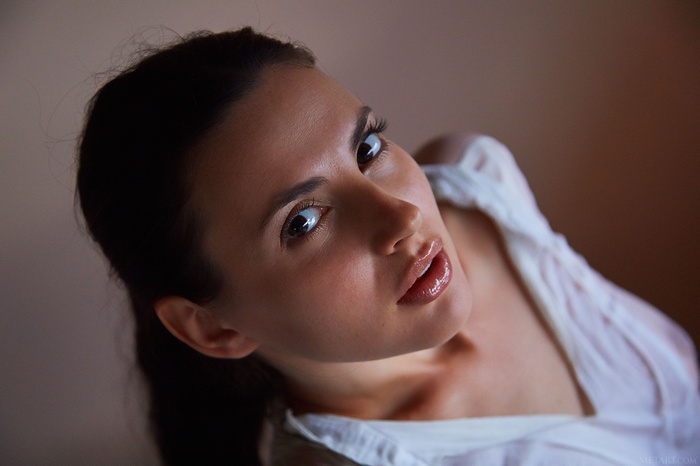 Jasmine Jazz in a white shirt
