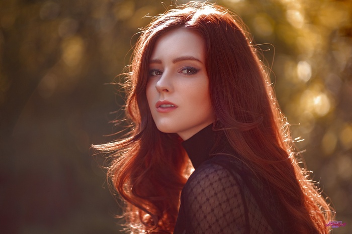 Redhead woman with long hair, Alexandra Girskaya