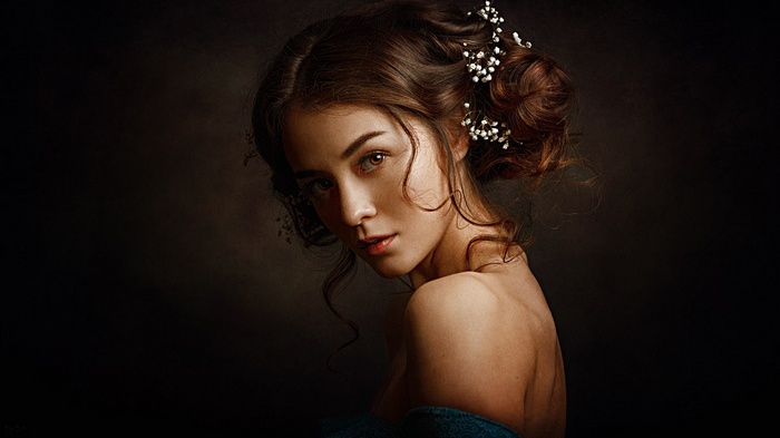 Portrait of a woman with flowers in her hair