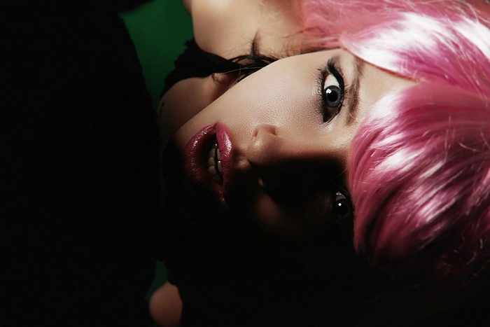Woman with pink hair and piercing