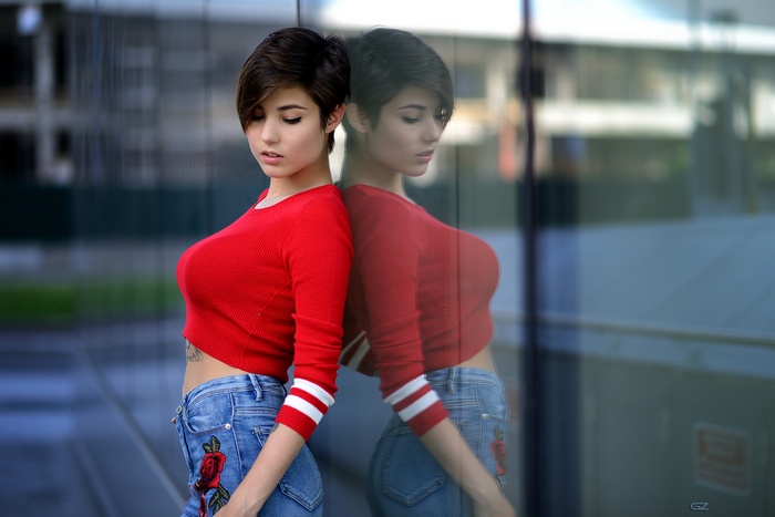 Giorgia Soleri in red top and denim jeans
