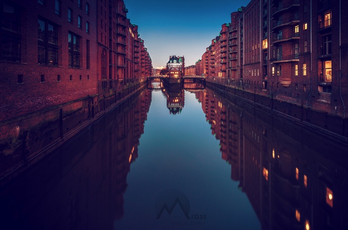 Warehouse canal reflection architecture by Sebastian Mrass