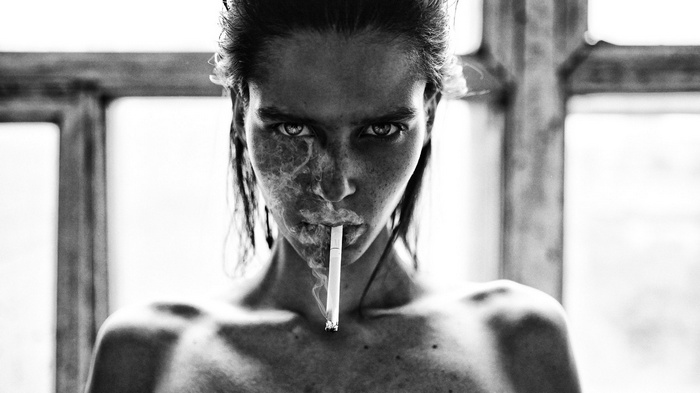 Aleksey Trifonov smoking a cigarette