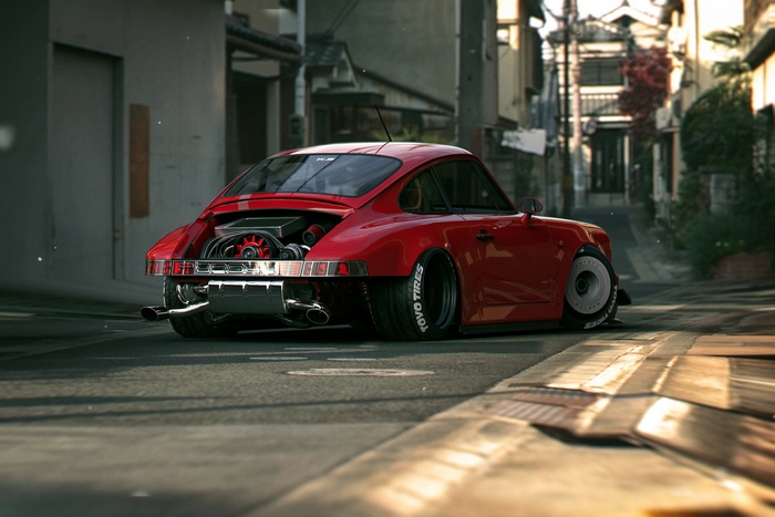 Red Porsche 911 with exposed engine