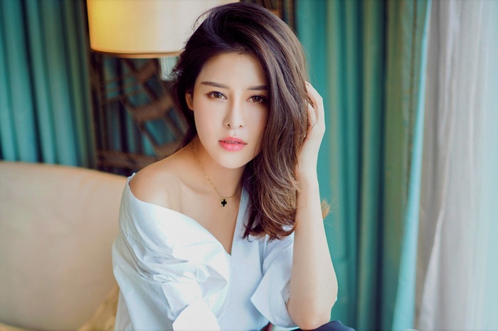 women, hands in hair, hair on one side, hazel eyes, bare shoulders, Asian