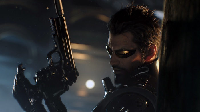 Adam Jensen from Deus Ex holding a gun