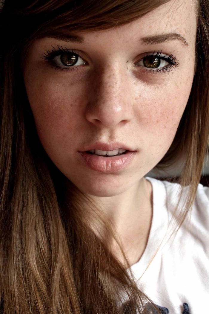 Woman with brown eyes and freckles