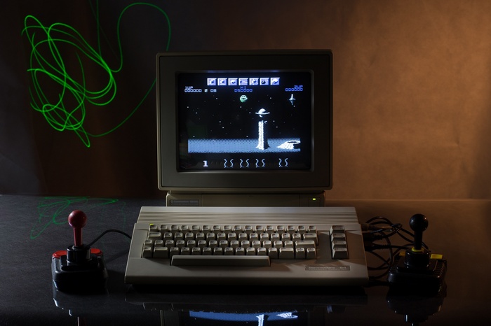 Commodore 64 computer playing Wizball with joysticks