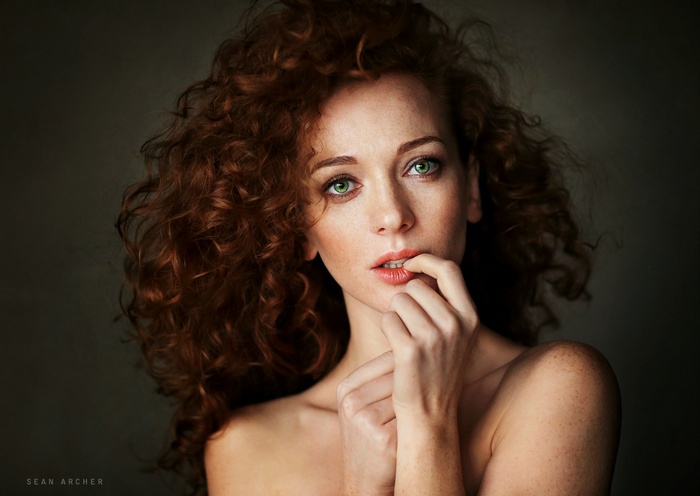 Redhead woman with curly hair by Sean Archer