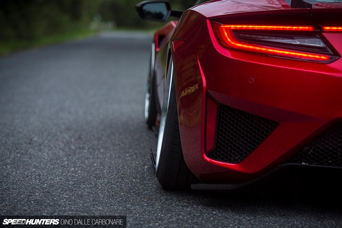Red Honda NSX with widebody kit and camber