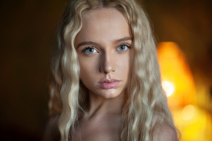 Portrait of Maria Popova with blonde hair
