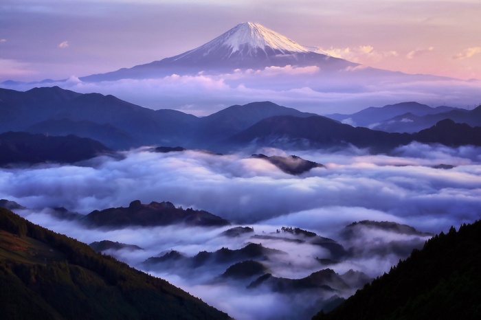 Mount Fuji above clouds at sunrise