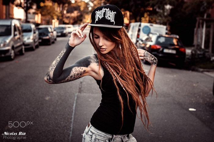 lip ring, dreadlocks, women, armpits, depth of field, portrait, nose rings, women outdoors, baseball caps, tattoo, street