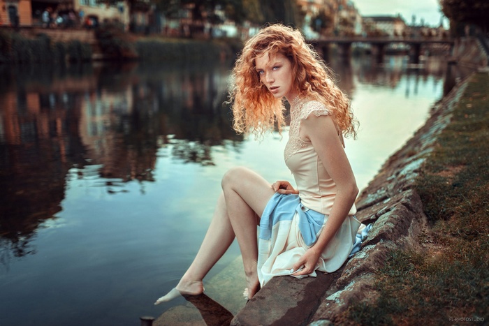 redhead, water, curly hair, Lods Franck, sitting, women, legs, riverside, barefoot, freckles, blue eyes, long hair, skirt, women outdoors, river, portrait