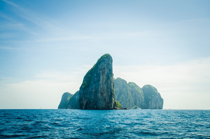 Rocky islands in the sea under a blue sky