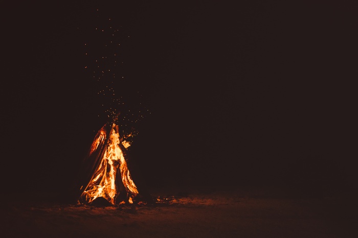 Campfire burning at night
