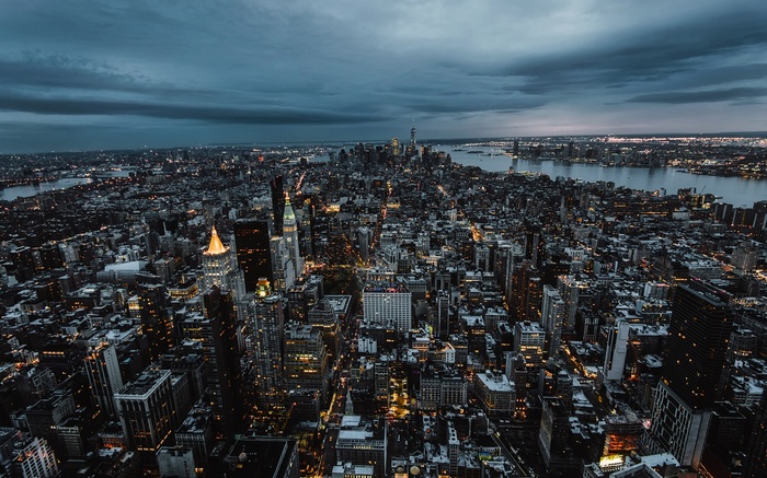 New York City skyline at dusk with city lights