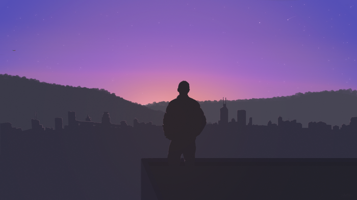 Silhouette of a person overlooking a city at dusk