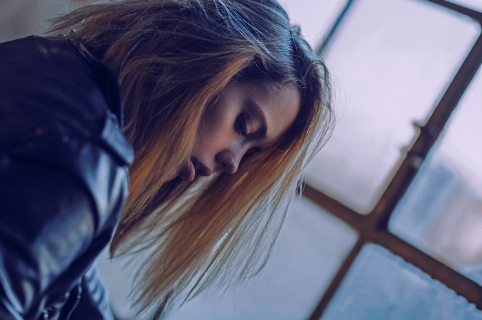 Portrait of a young woman with blonde hair