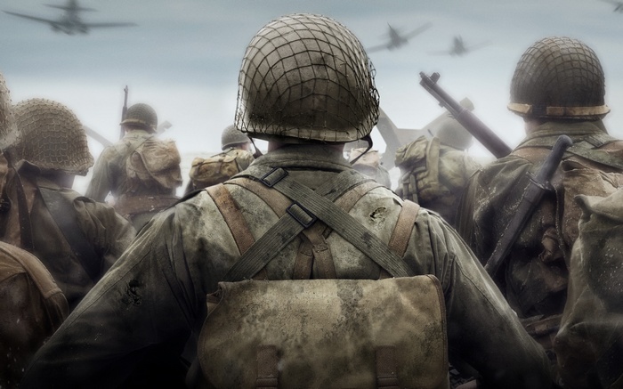Soldiers in uniform with helmets and backpacks