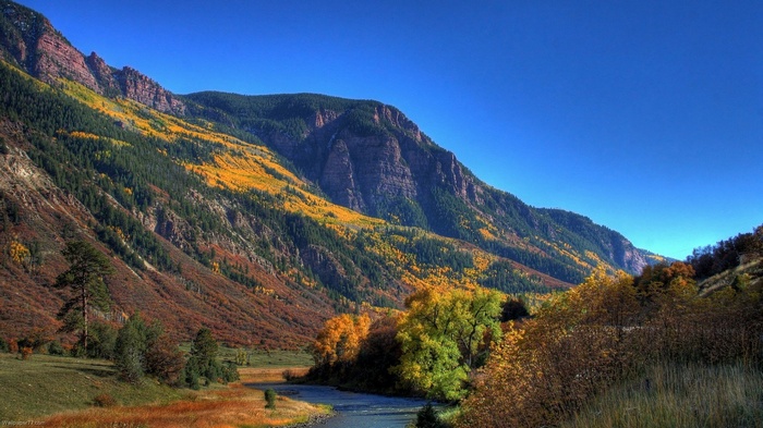 Autumn mountain valley with a river