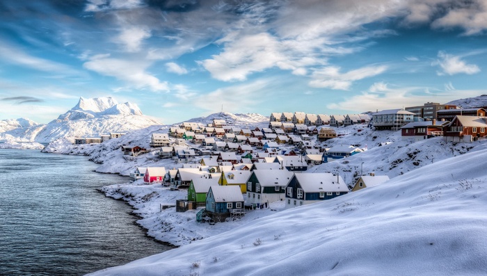 Colorful houses in a snowy Greenland village