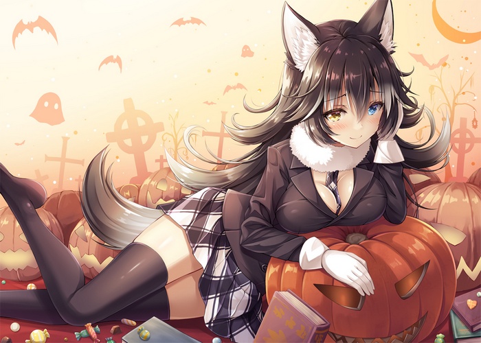 Wolf girl in Halloween costume with pumpkins