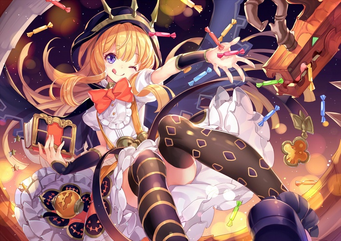Girl in Halloween costume with candy and book