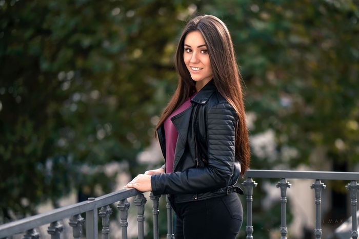 women, open mouth, depth of field, straight hair, brown eyes, model, Lenka, leather jackets, smiling, long hair, women outdoors, looking at viewer, jacket, Cyril Max, balcony, portrait, jeans