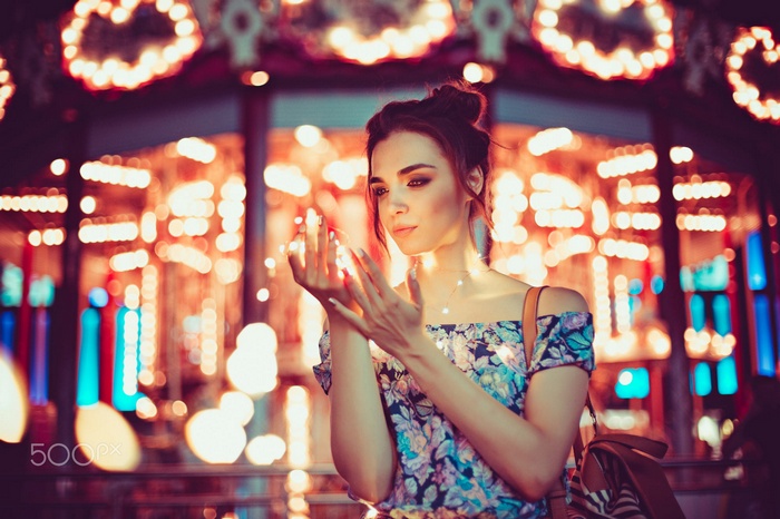 Woman with lights and bokeh background