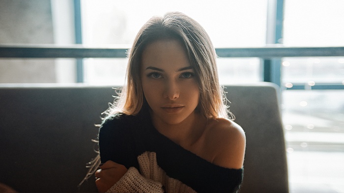 Woman with blonde hair and blue eyes