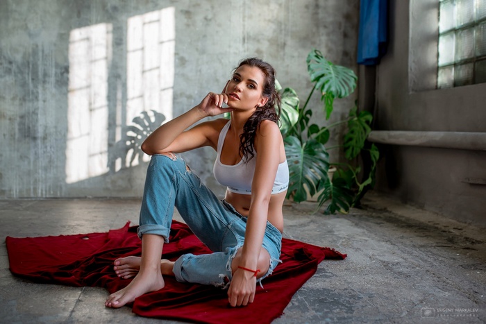 Evgeny Markalev, women, kabbalah, brunette, tanned, blue eyes, portrait, on the floor, sports bra, long hair, sitting, torn jeans, barefoot
