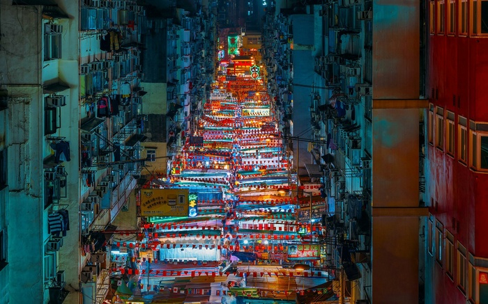 Street scene in Hong Kong at night with colorful lights