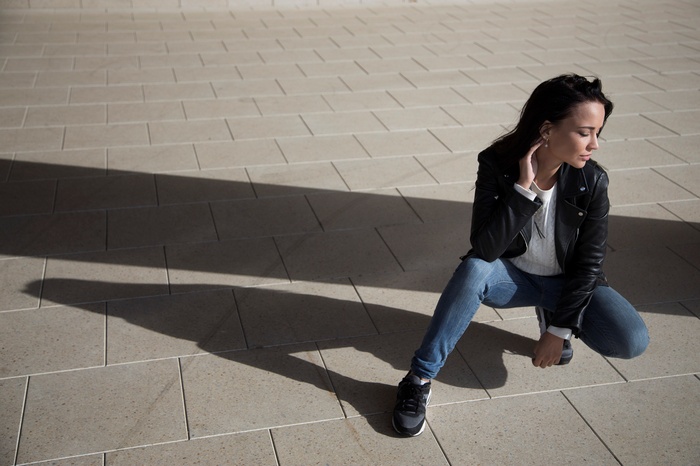 closed eyes, sneakers, Angelina Petrova, shadow, model, squatting, leather jackets, women, women outdoors, jeans