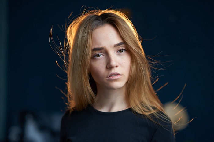 Portrait of a young woman with blonde hair