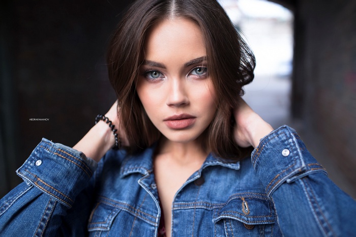 Portrait of a woman in a denim jacket by Lenar Abdrakhmanov