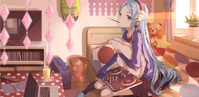 Girl with blue hair and headphones eating a snack