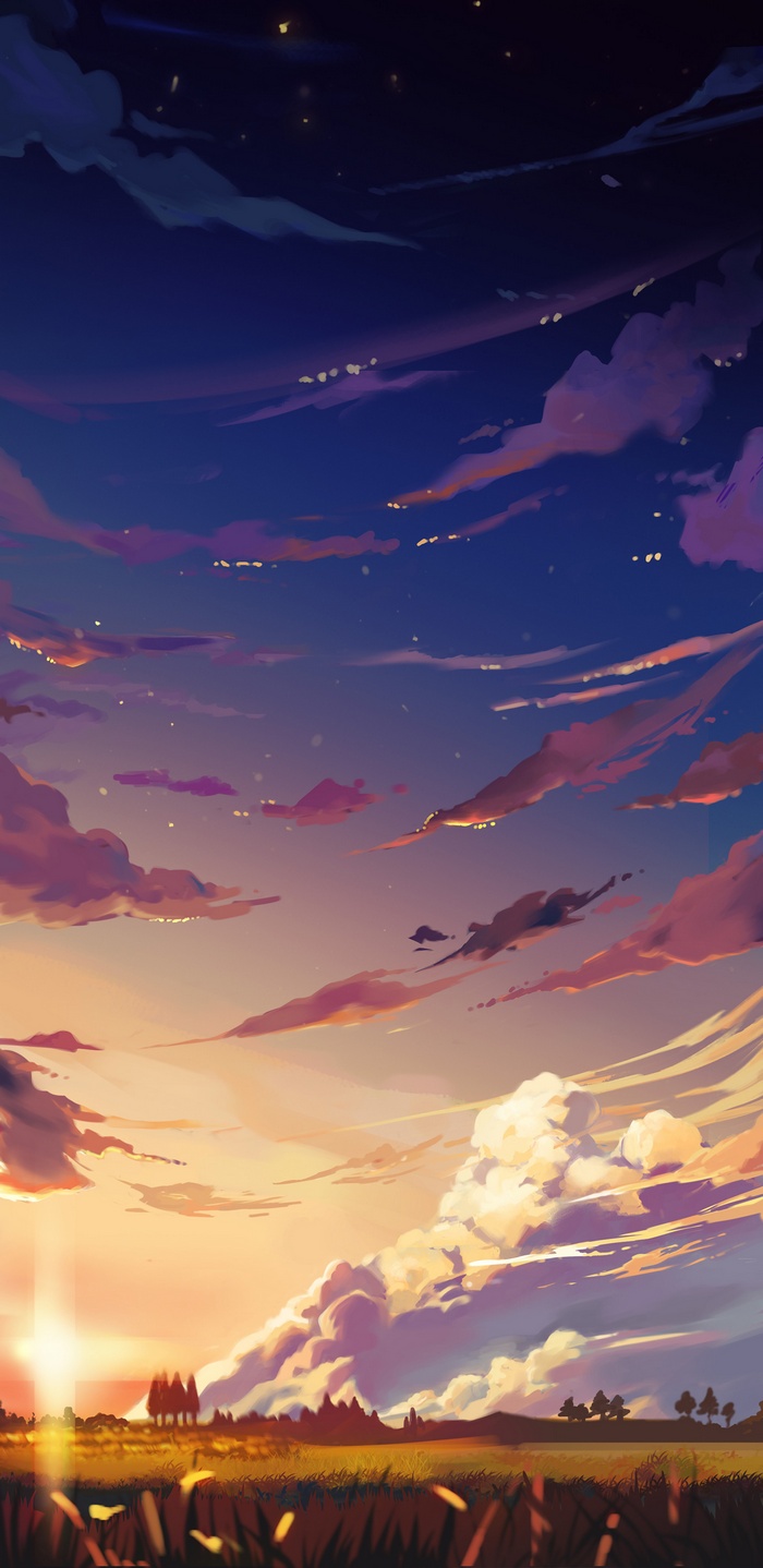 Sunset clouds over a field